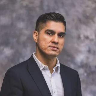 Stock portrait illustrating Quinn Hayes, a fictional demo profile